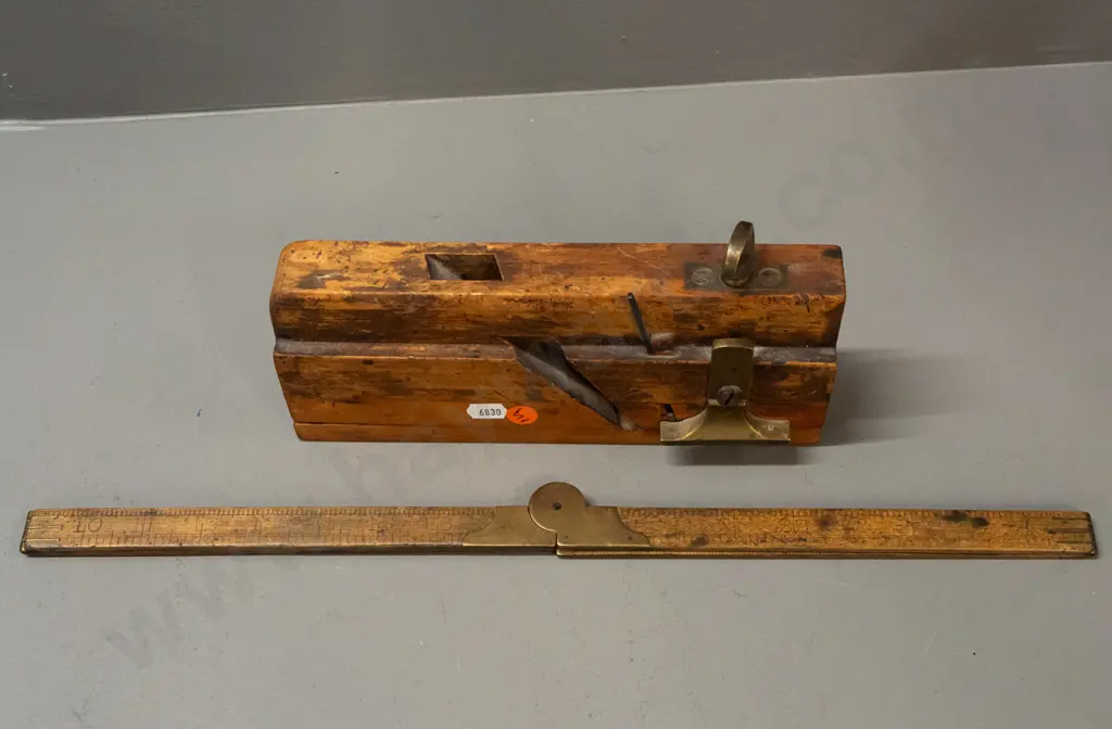 vintage moulding plane marked Griffiths Norwich L-240 and a folding rule with brass fittings - age wear and staining Image 1++