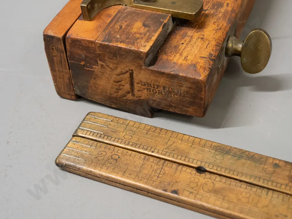 vintage moulding plane marked Griffiths Norwich L-240 and a folding rule with brass fittings - age wear and staining Image 1++