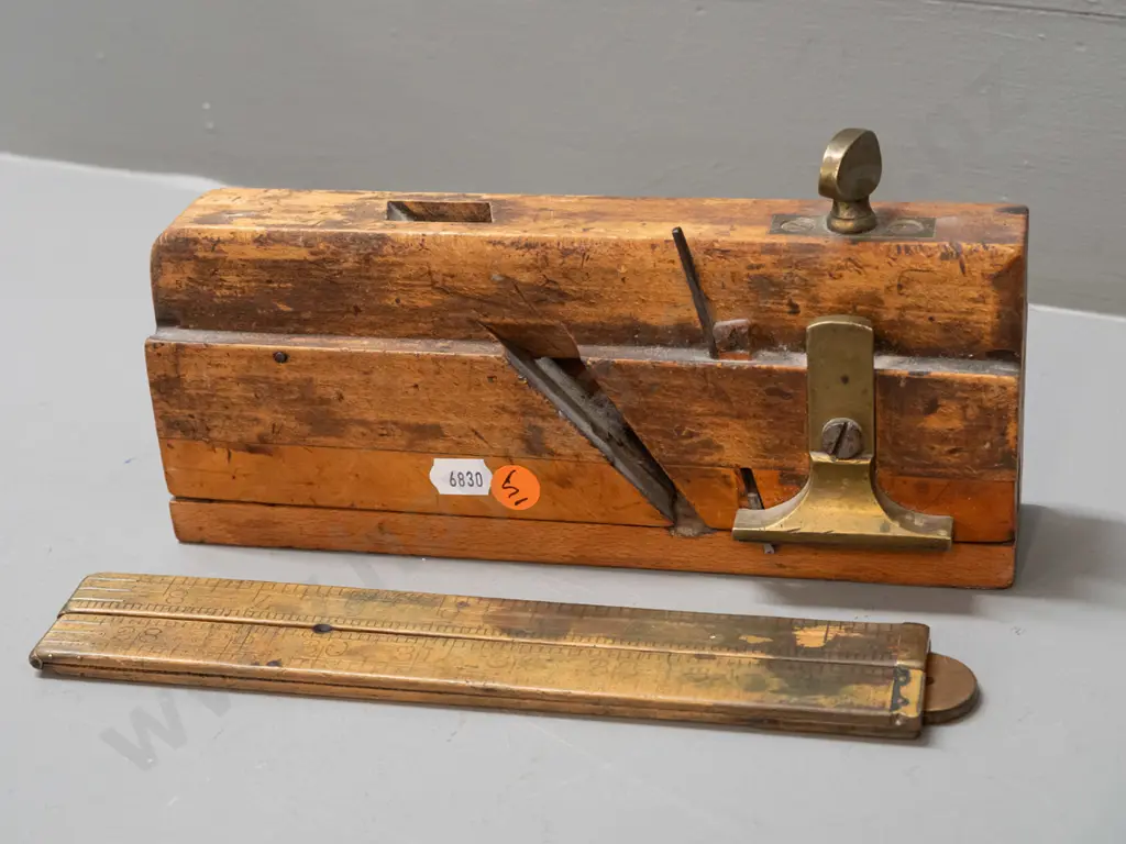 vintage moulding plane marked Griffiths Norwich L-240 and a folding rule with brass fittings - age wear and staining Image 1++