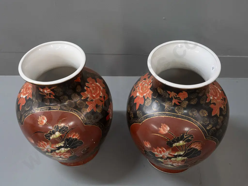 pair of Chinese bolster-shaped vases with floral decoration and gilt highlights - chipping to base of one, some Image 1++