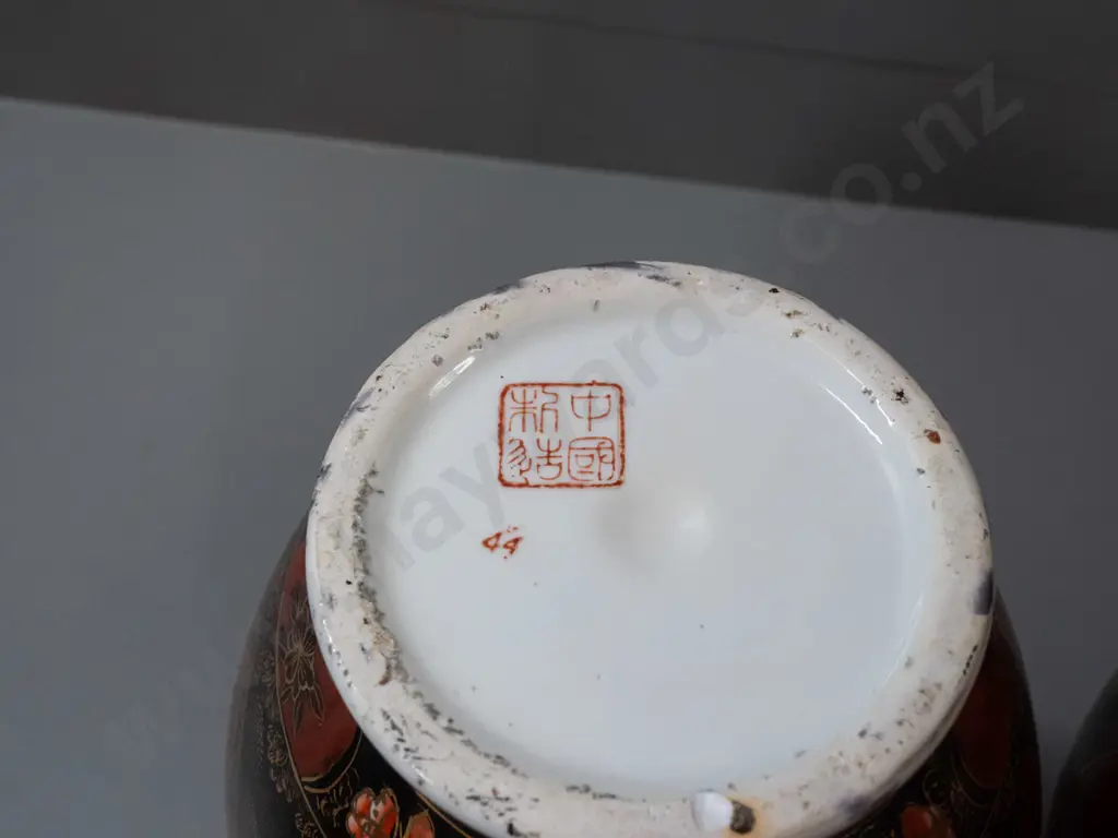 pair of Chinese bolster-shaped vases with floral decoration and gilt highlights - chipping to base of one, some Image 1++