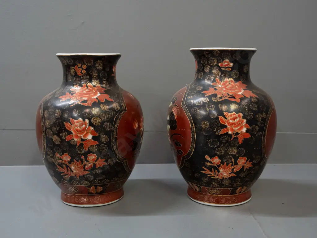 pair of Chinese bolster-shaped vases with floral decoration and gilt highlights - chipping to base of one, some Image 1++