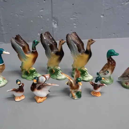 assorted small duck figures, mixed styles, no maker's marks - 2 plaster ones marked Japan, one ceramic mallard marked