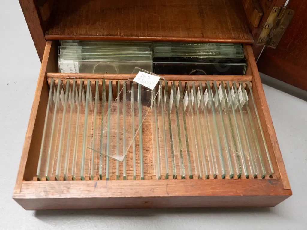 brass microscope in fitted mahogany cased with glass slides in drawer - drawer is missing knob, microscope may be Image 1++