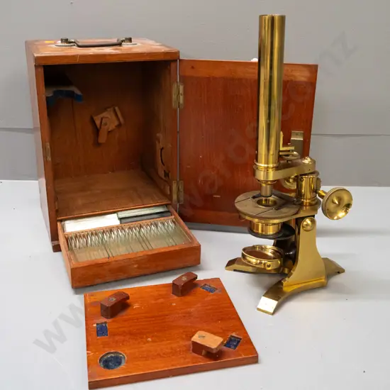 brass microscope in fitted mahogany cased with glass slides in drawer - drawer is missing knob, microscope may be