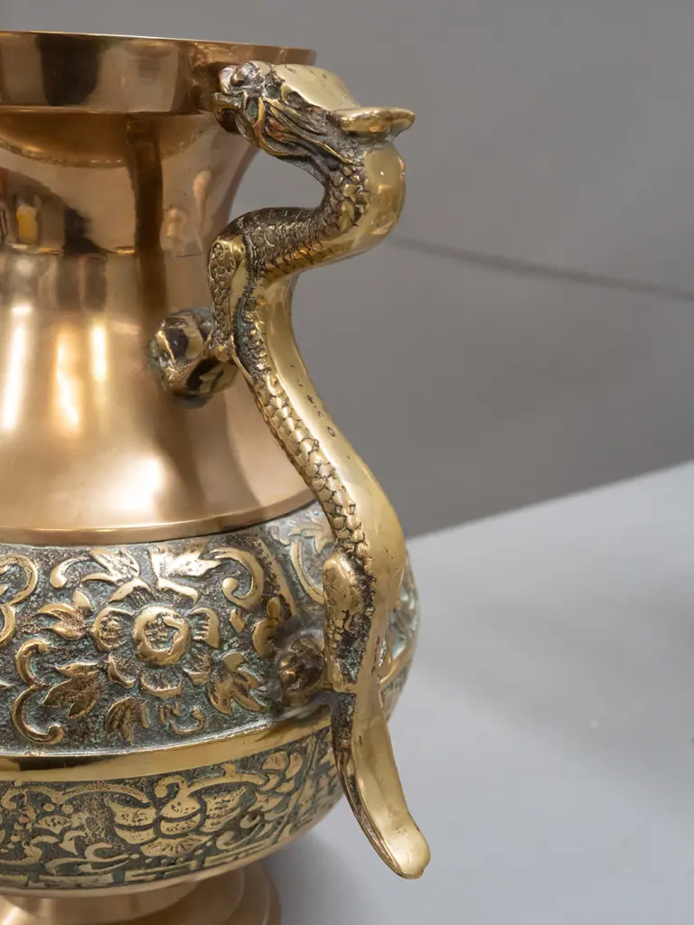 brass vase with band of cast decoration and cast dragon handles - minor pitting to cast areas H-290 W-250 across handles Image 1++