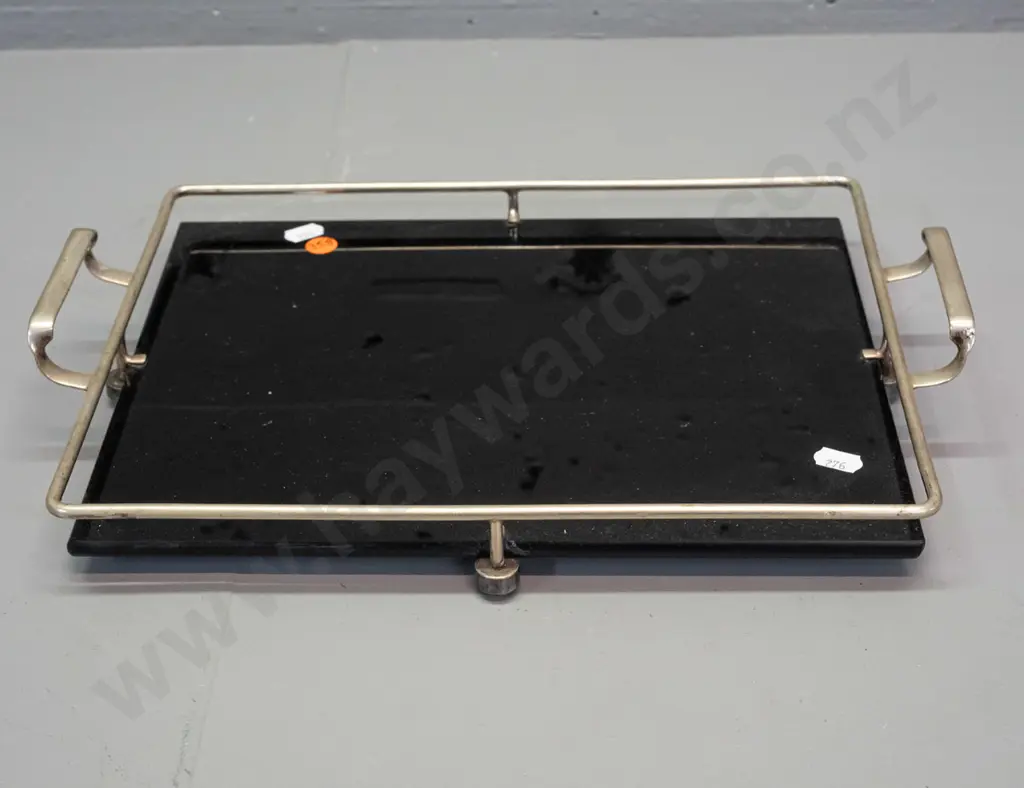 art deco black glass or vitrolite tray with plated gallery and handles, ridged texture on underside, on plated ball feet Image 1++