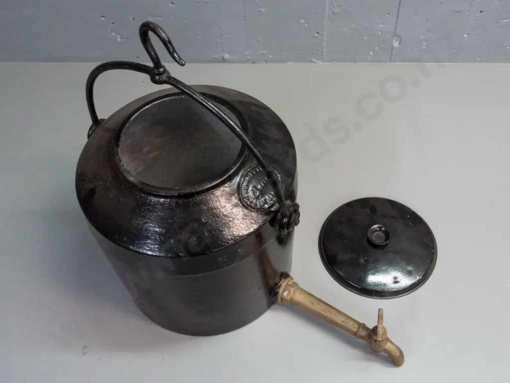 Kenrick 4 Gallon heavy cast iron camp kettle with brass spigot and hanging hook handle, probably replacement lid. Image 1++