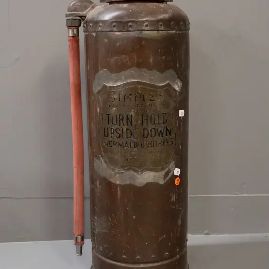 vintage copper Simplex / Wormald Brothers fire extinguisher with brass shield and fittings - age wear to hose, shield