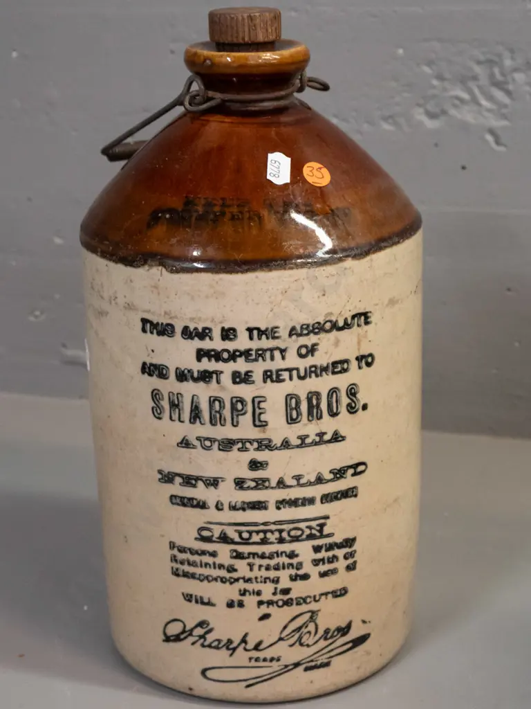 Sharpe Brothers Australia and New Zealand stoneware crock with Bendigo Potteries manufacturer's mark, threaded wooden Image 1++