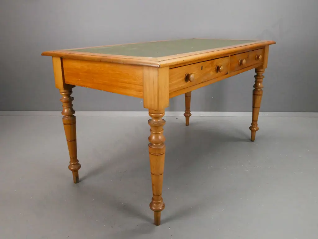 colonial rimu turned-leg library table with inset green leather writing surface, 2 drawers w/wooden knobs. Some bubbling Image 1++