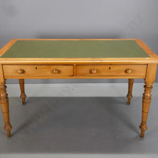 colonial rimu turned-leg library table with inset green leather writing surface, 2 drawers w/wooden knobs. Some bubbling
