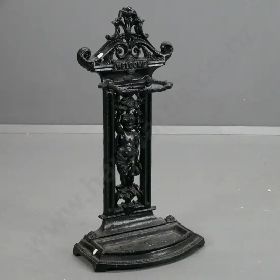 cast alloy umbrella & stick stand with putti motifs and "Welcome" - with drip tray - some paint chips H-740 W-390 D-200
