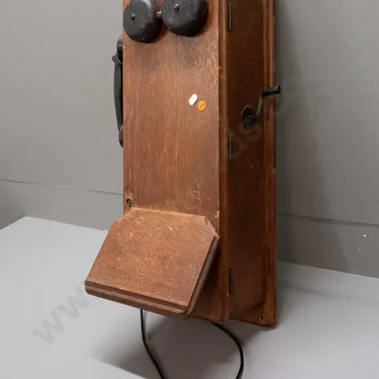 vintage oak-cased wall mount hand-crank telephone with bakelite hand set - fitted with 2 batteries made in 1971, inside