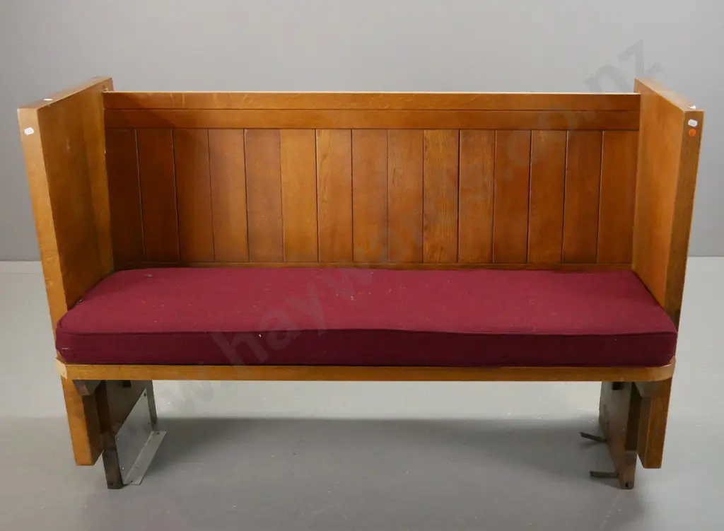 compact (3 seat?) oak church pew with maroon upholstered squab, metal floor mounting brackets. Some splintering at one Image 1++
