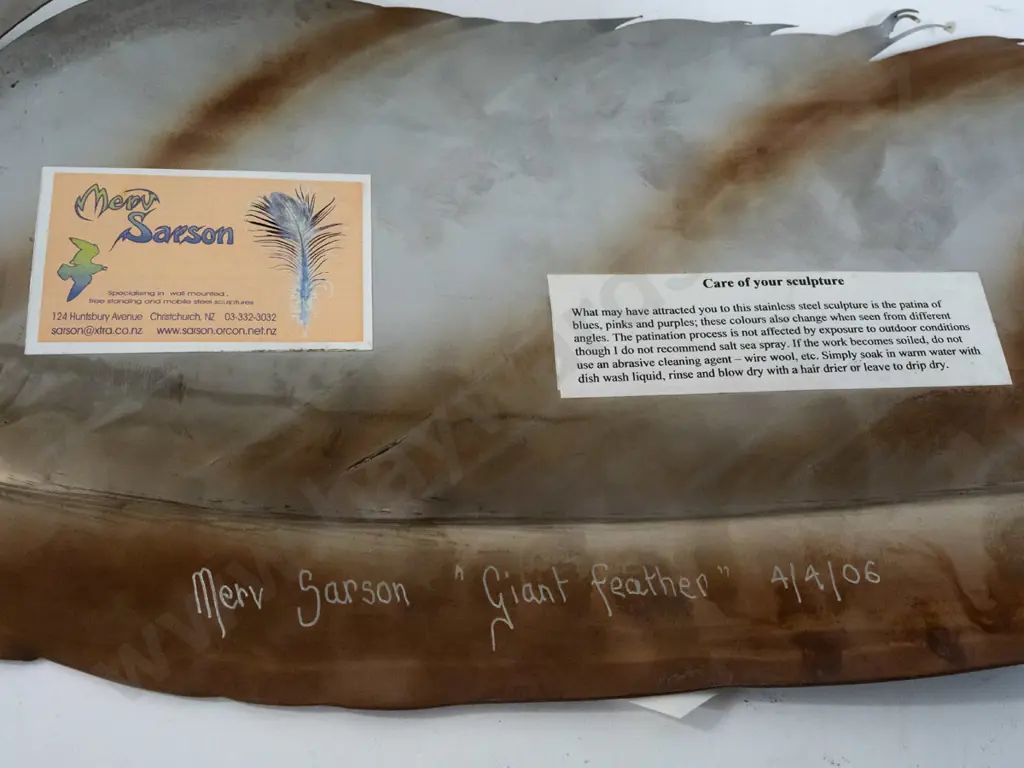 large wall-mount stainless steel feather, patina'd surface, made by Merv Sarson, dated 4/4/06. H-1120 W-210 Image 1++