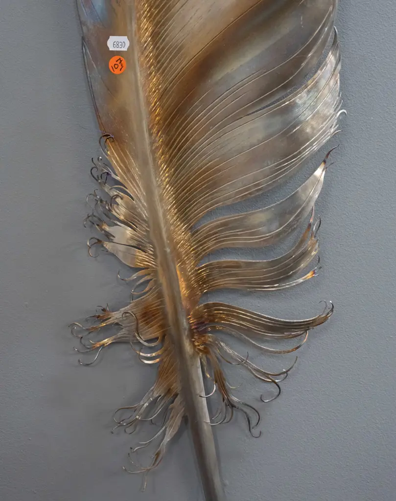 large wall-mount stainless steel feather, patina'd surface, made by Merv Sarson, dated 4/4/06. H-1120 W-210 Image 1++