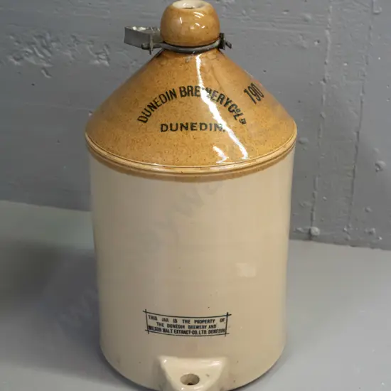 large narrow mouth stoneware crock: Dunedin Brewery Co. Ltd. & Wilson Malt Extract Co. Dunedin. Metal handle, no stopper