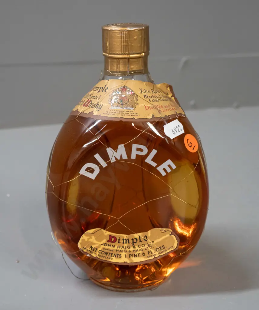 vintage bottle of John Haig & Co "Dimple" scotch whisky - dimpled bottle with mesh cover - 1 pint 6 ounce (approx 700ml) Image 1++