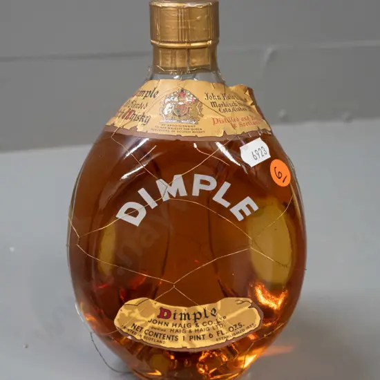 vintage bottle of John Haig & Co "Dimple" scotch whisky - dimpled bottle with mesh cover - 1 pint 6 ounce (approx 700ml)