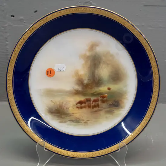 Royal Worcester highland cattle scene cabinet plate with gilt rim, signed James Stinton, circa 1912 according to label.