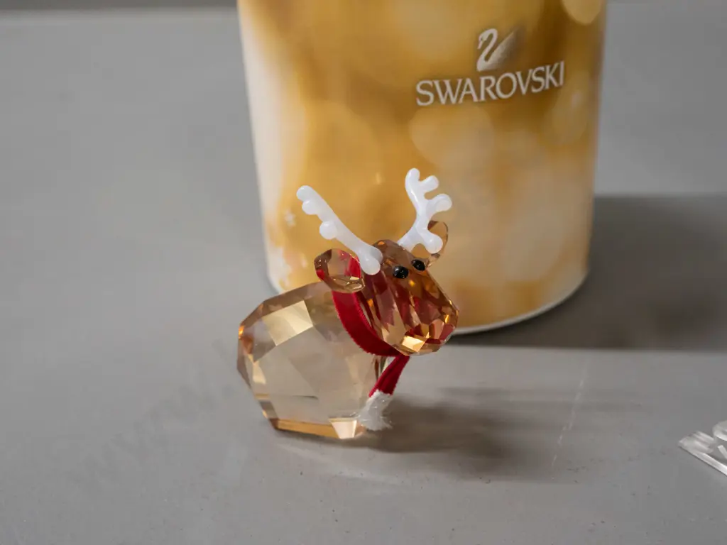 Swarovski crystal Christmas themed ornaments - sleigh set with presents & tree and a small reindeer, both with original Image 1++