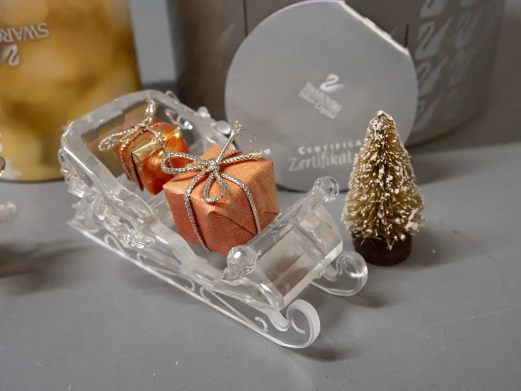Swarovski crystal Christmas themed ornaments - sleigh set with presents & tree and a small reindeer, both with original Image 1++