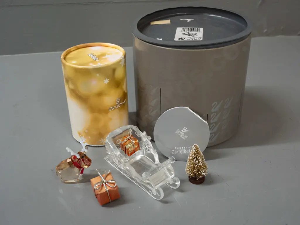 Swarovski crystal Christmas themed ornaments - sleigh set with presents & tree and a small reindeer, both with original Image 1++