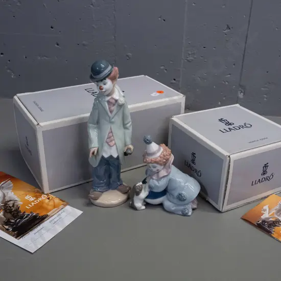 2 Lladro child clown figurines with original boxes - Pierrot with puppy & "Circus Sam" with violin H-220