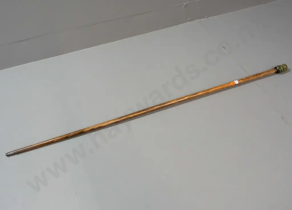 walking stick with brass ferrule, ceramic tiki knob. Cane has age wear, tiki may have been added more recently - L-950 Image 1++