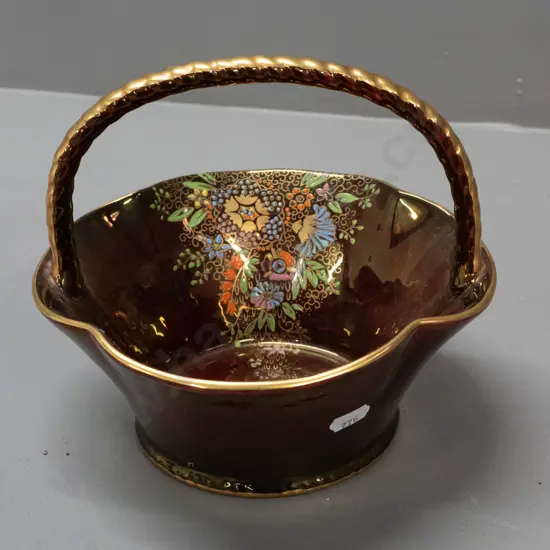 Crown Devon basket - raised floral enamel decoration on red ground, gilded rim and twisted handle H-170 L-190