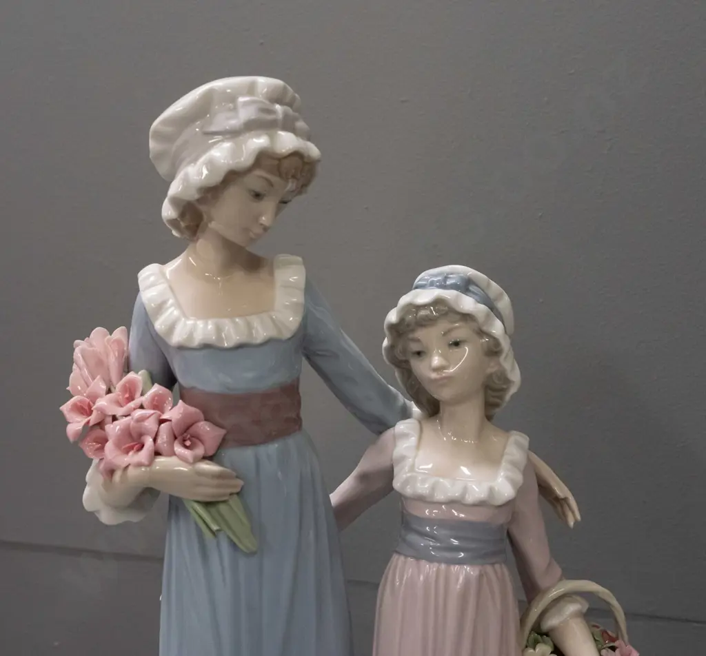 Lladro figurine - two girls with flowers, small chip to one pink flower petal H-330 Image 1++