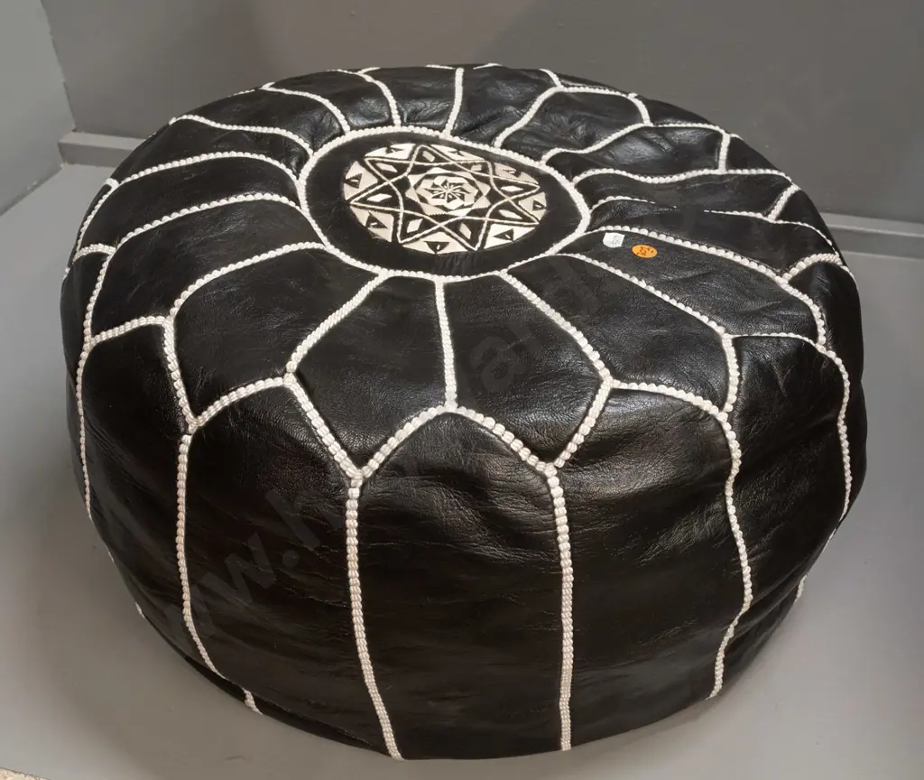 black leather pouffe with geometric white rope-effect stitching - a little minor flaking to leather on bottom edge H-290 Image 1++