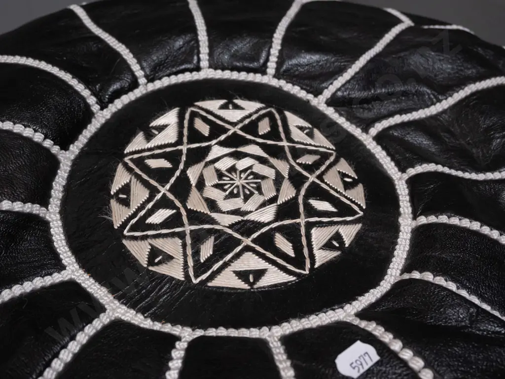 black leather pouffe with geometric white rope-effect stitching - a little minor flaking to leather on bottom edge H-290 Image 1++