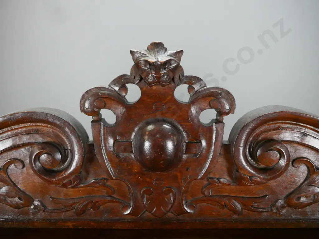 antique French 1870s oak desk with carved lion's head crest and corbels, 5 drawer bank in top, slide-out writing surface Image 1++
