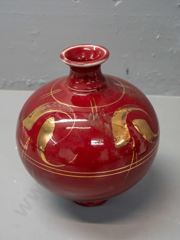 Paul Laird New Zealand studio pottery bottle vase - gilt decoration over dark red, label marked Whirling Dervish Bottle Image 1++