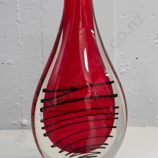very heavy art glass vase - clear over red core with black swirling pattern, flattened bottle shape H-310 W-150