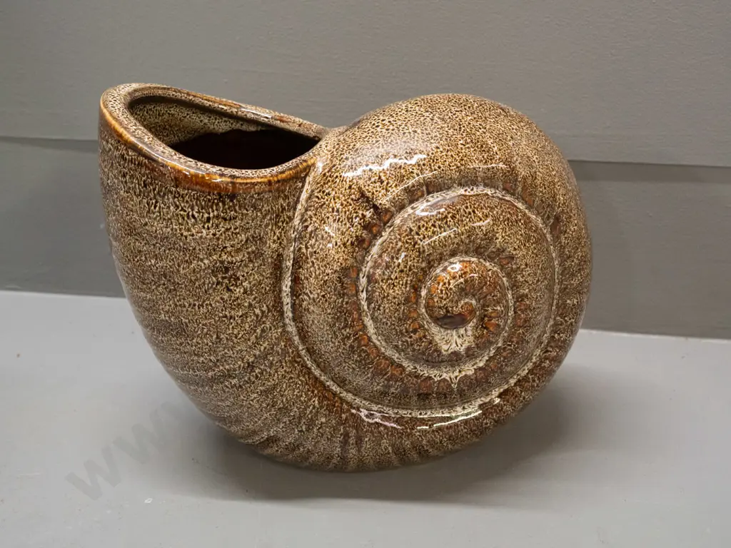 nautilus shell vase in mottled brown glaze, no maker's marks H-180 L-250 Image 1++