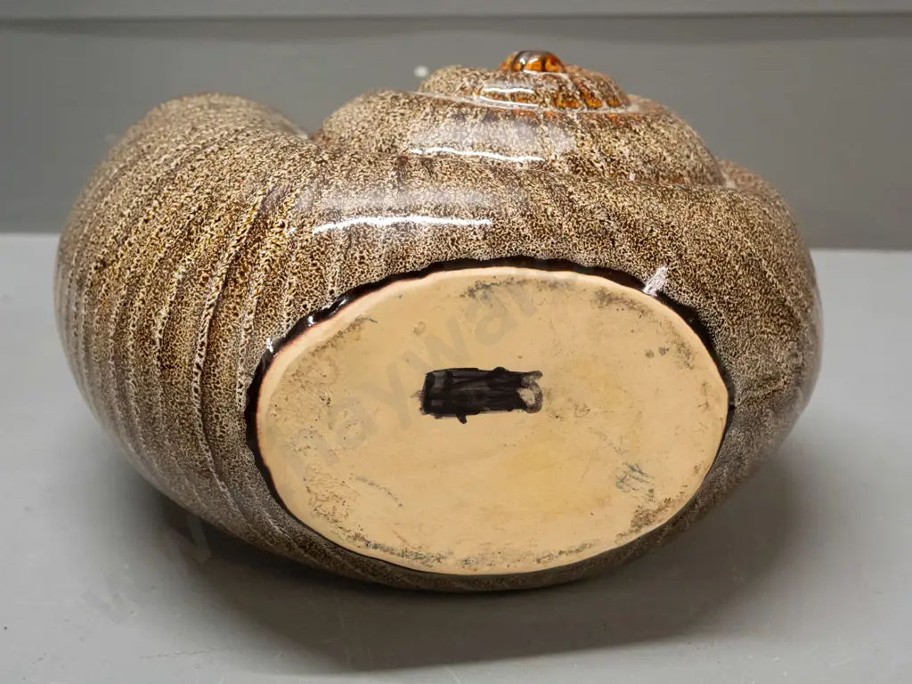 nautilus shell vase in mottled brown glaze, no maker's marks H-180 L-250 Image 1++