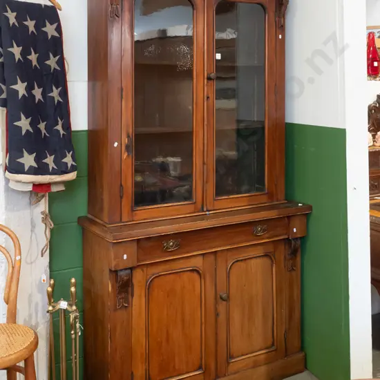 late Victorian mahogany bookcase chiffonier: 2 archtop glazed doors, w/ 2 adjustable replacement shelves. Base long top