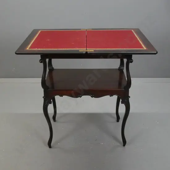 vintage mahogany 2-tiered games table with fold-out top, gold-tooled leather and felt top insert, shaped cab legs and