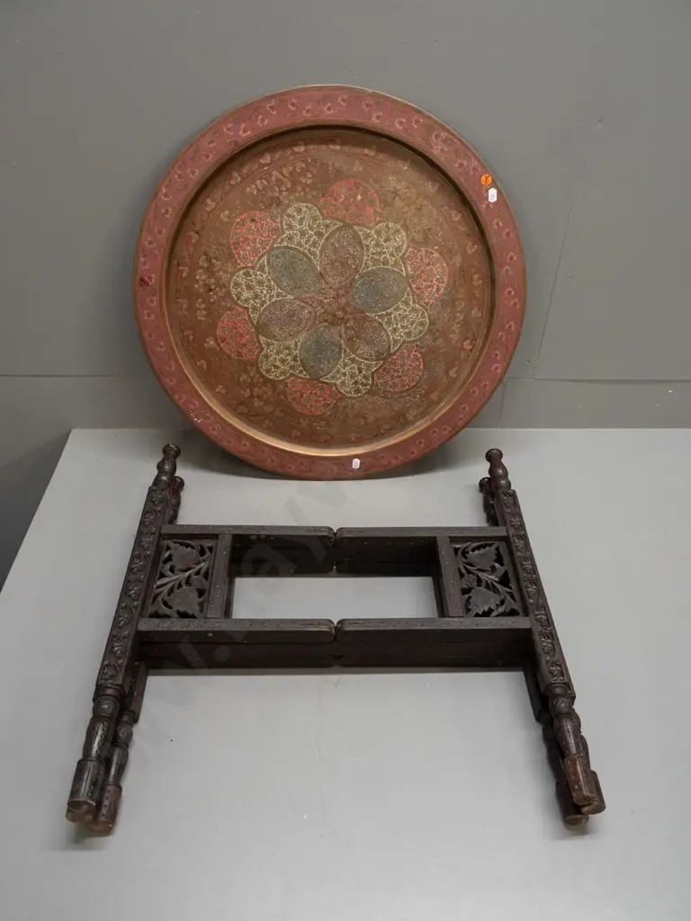 brass tray table with folding 6-legged hardwood base - hinged legs with carved and pierced decoration, etched brass tray Image 1++