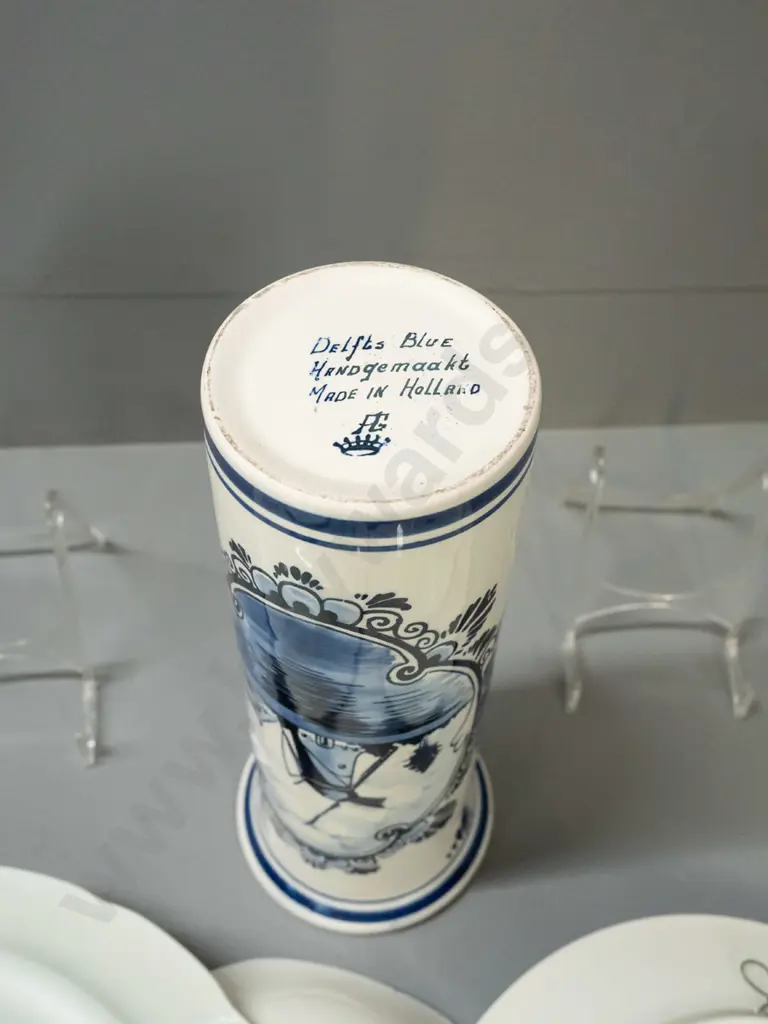 4 pieces blue and white ware - 3 Delft, one Doulton Norfolk - 2 Delft plates with wall hangers on back, tall cylindrical Image 1++