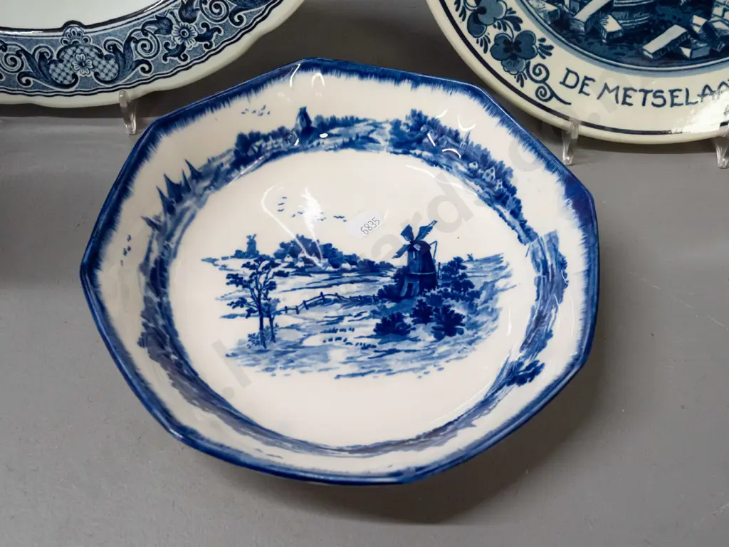 4 pieces blue and white ware - 3 Delft, one Doulton Norfolk - 2 Delft plates with wall hangers on back, tall cylindrical Image 1++