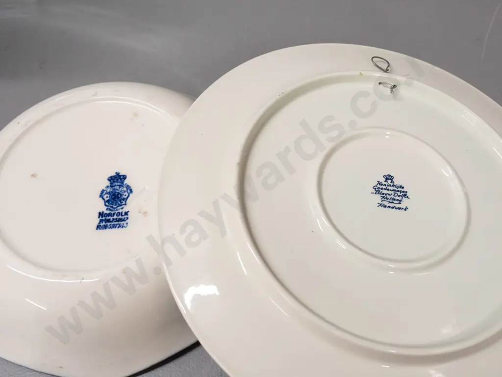 4 pieces blue and white ware - 3 Delft, one Doulton Norfolk - 2 Delft plates with wall hangers on back, tall cylindrical Image 1++