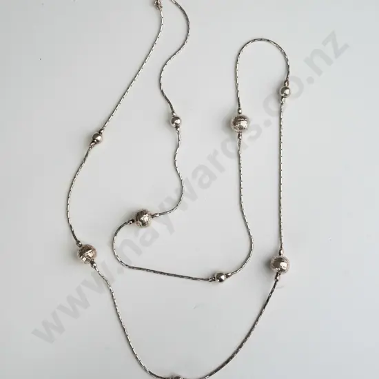long silver necklace stamped 925