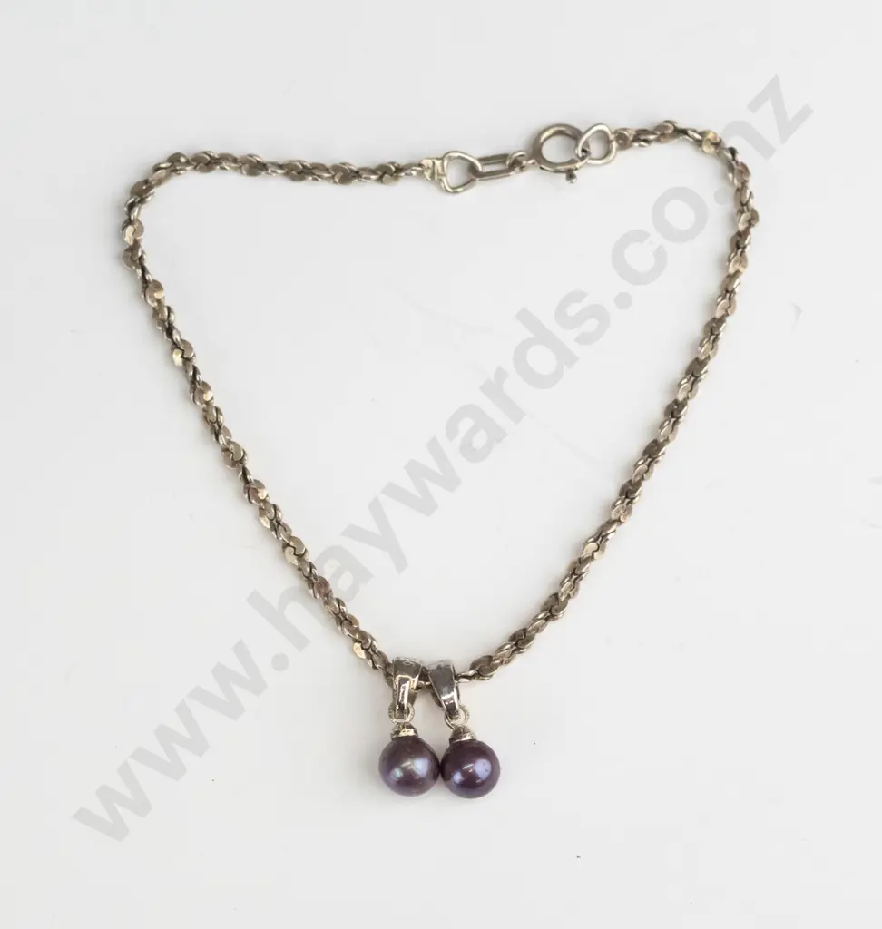 silver bracelet with 2 purple balls stamped 925 Image 1++