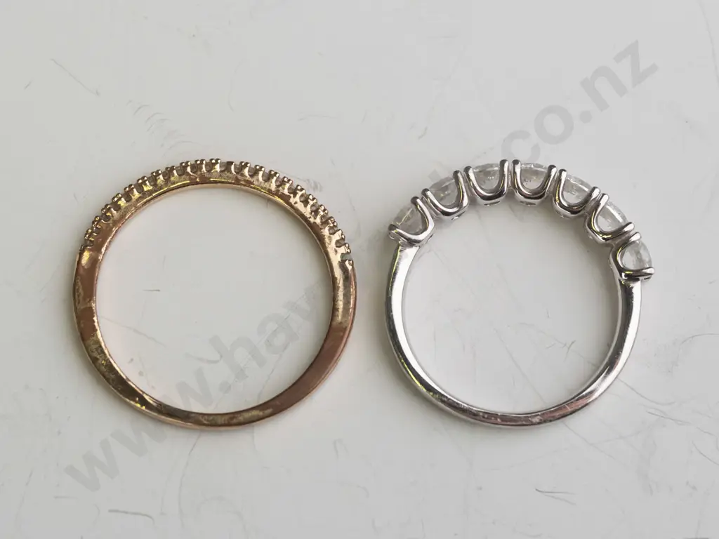 2 silver cz rings both stamped 925 Image 1++
