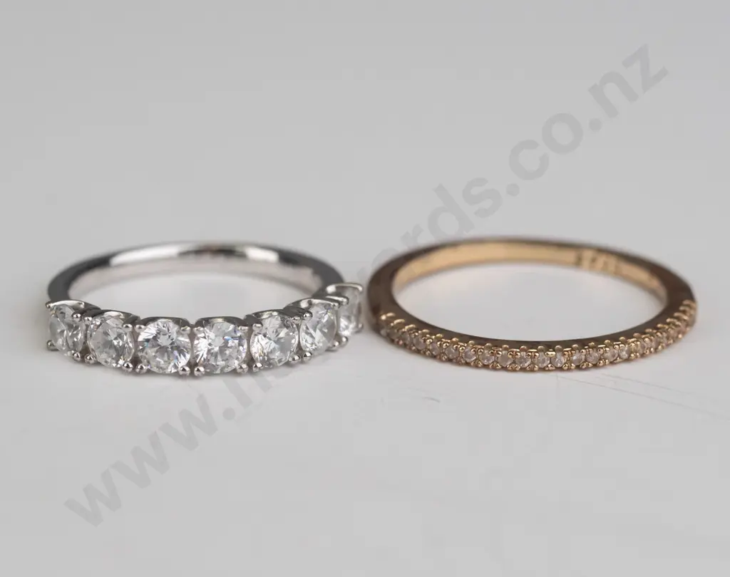 2 silver cz rings both stamped 925 Image 1++