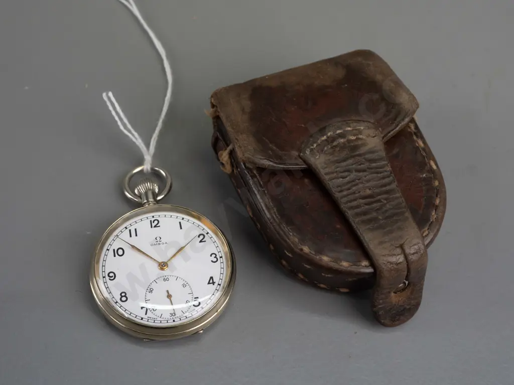 Omega pocket watch, nickel case, with leather carry pouch Image 1++